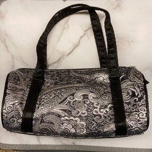 Silver and black clutch with zipper